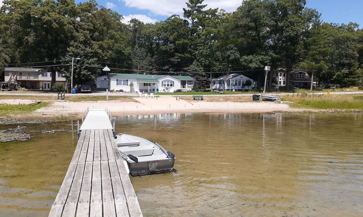 Fountain House | Beachfront retreat on beautiful Tallman lake near HuronManistee National Forest.