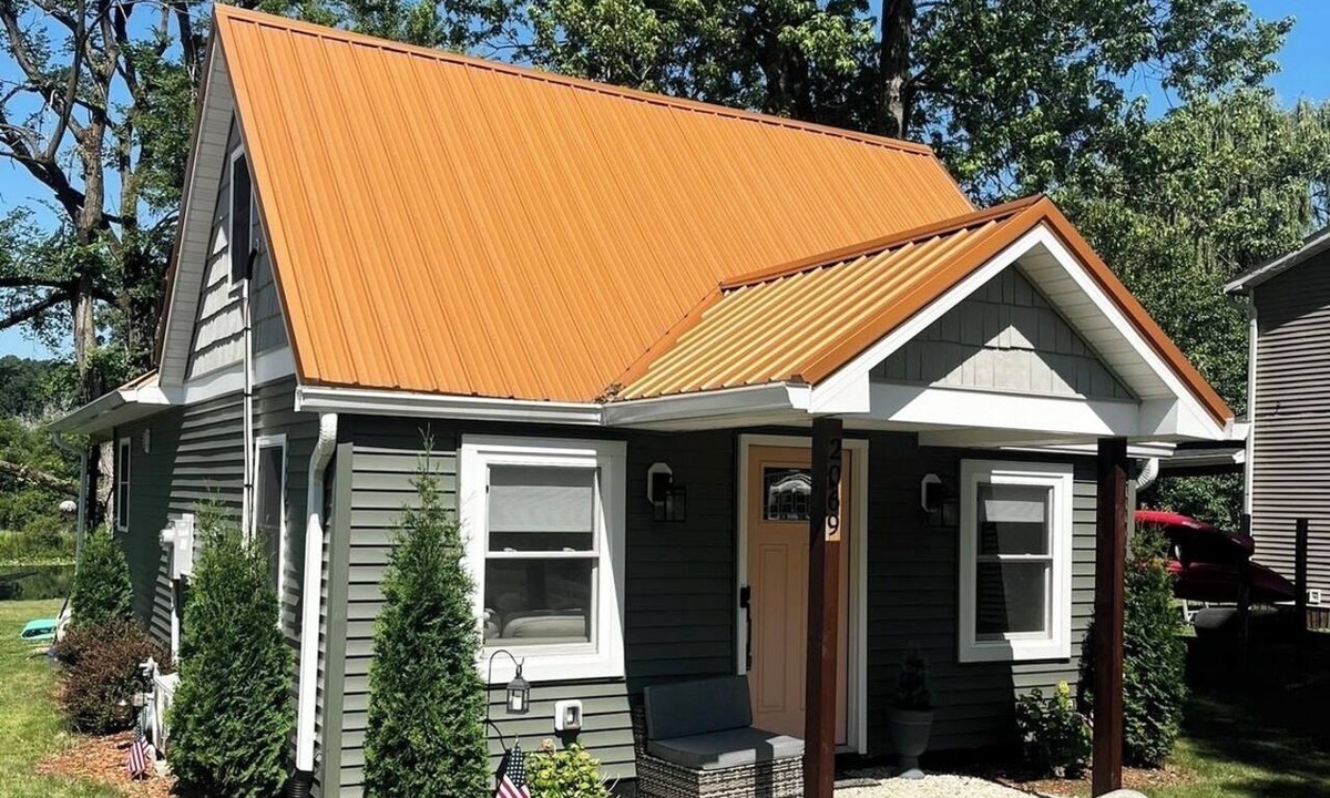 Dowling House | Bungalow on the water offers a canoe, paddle boards, paddle boat, fishing gear.