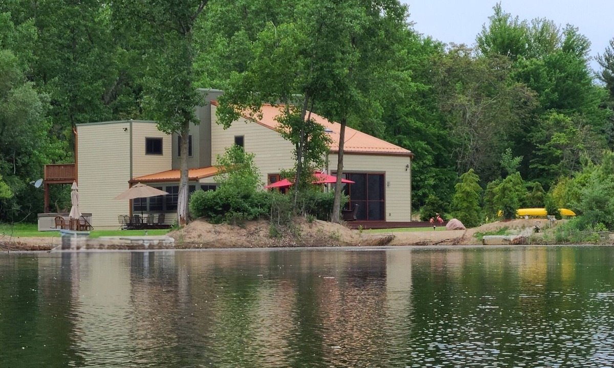 Stevensville House | Contemporary home, 4 wooded acres, 200' lakefront; Dock; Backyard; Lake lounge