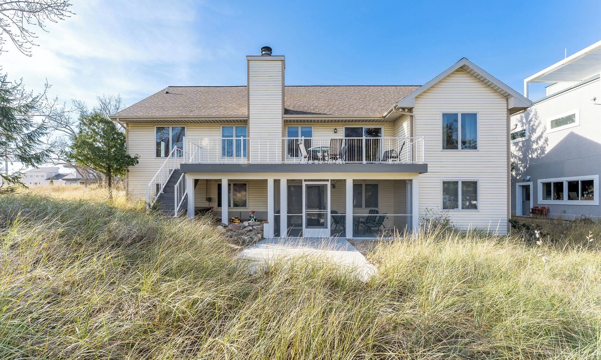 Spring Lake House | Experience lakeside luxury at Sunset Cove, a spacious 5-bedroom home