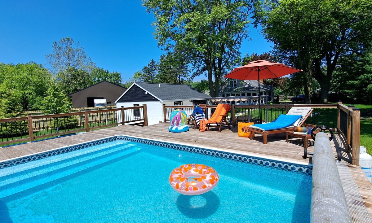 Shorewood-Tower Hills-Harbert House | Heated pool hot tub play set screened porch sauna putting green