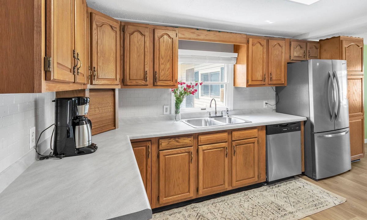 Ada House | Lakefront Home sleeps 10 on small quiet lake
