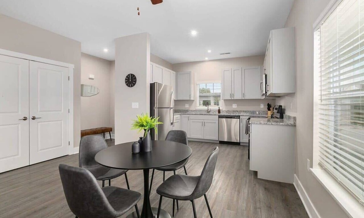 Grandville Apartment | Modern 4BR 4BA Two Unit Condo w Garage and Patio