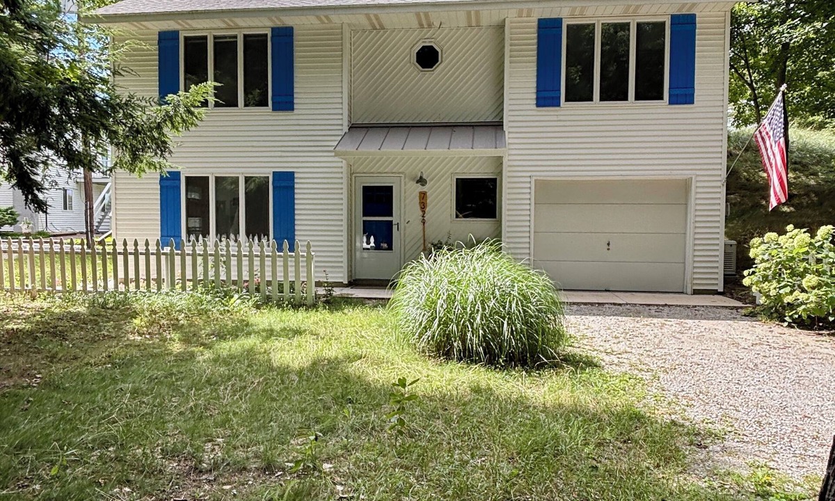Montague House | Stunning Lake Michigan Views with 110 Feet Private Beach on One Acre.