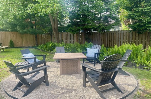 Saugatuck House | A Step Away: The Haven – Walk to Town Getaway~Dog Friendly~Fenced Yard~Fire Pit