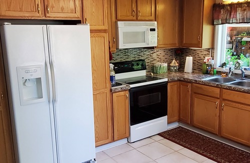 Grand Junction House | Beautiful Lake Home with Tiki Bar for EXTRA FUN Home is governed by Ordinance