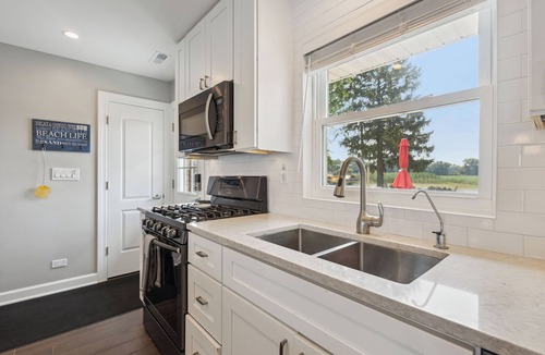 Decatur House | Beautiful Lake House with 150' sandy beach on 85 acre all sports lake