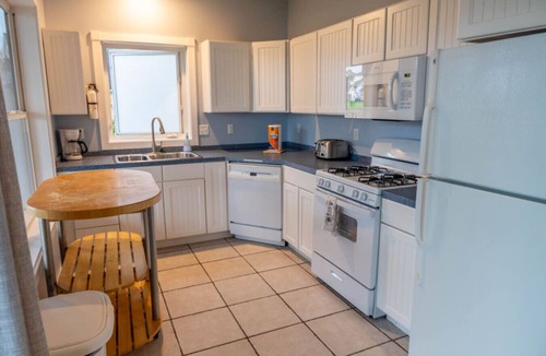 Grand Rapids Apartment | Campau Lake Escape |1 of 4 levels | Hot tub karaoke game room