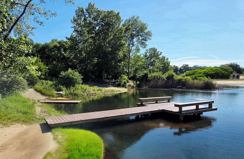 Stevensville House | Contemporary home, 4 wooded acres, 200' lakefront; Dock; Backyard; Lake lounge