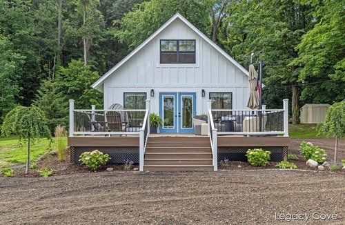Greenville Cottage | Cottage on the Lake w/pontoon! SUP boards, kayaks, hot tub, fire pit & fishing!