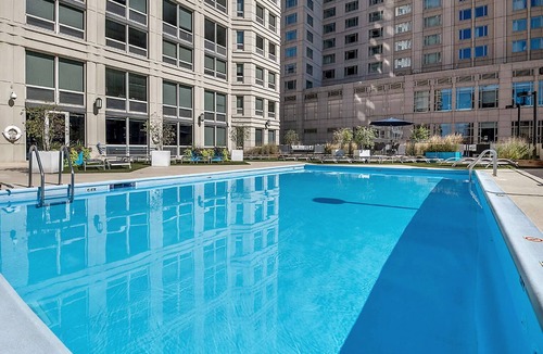 Rush and Division Apartment | Crisp River North 1BR w/Gym, Pool, nr. Oak Street Beach, by Blueground