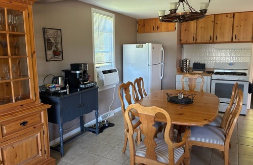 Ludington Cottage | Cutest cottage on Hamlin Lake. Lake views!