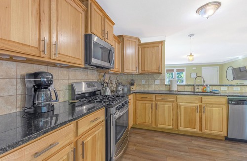 Saugatuck House | Emerald Oasis – Stylish Lakeshore Haven with Hot Tub & Fire Pit