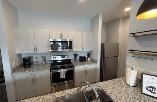 Speedway Apartment | Fast Lane Flat: Walk to Track, Dining & Parking