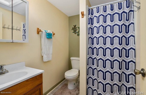 Shelbyville Cottage | Gun Lake Vacation Rental, Sandy beach, docks, picnic tables, kids play grounds