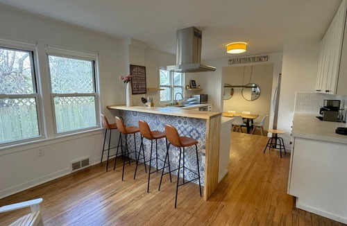Shorewood-Tower Hills-Harbert House | Heated pool hot tub play set screened porch sauna putting green