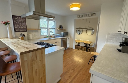 Shorewood-Tower Hills-Harbert House | Heated pool hot tub play set screened porch sauna putting green