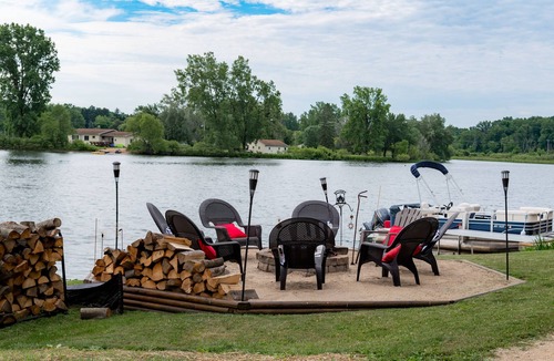 Dowling Cottage | Lake front property with a relaxing front deck overlooking Bristol Lake