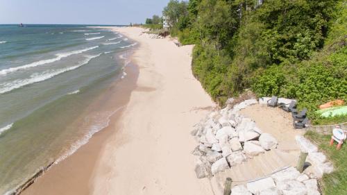 South Haven House | Lakefront Home - Pool, Hot Tub, Firepit & Private Beach!