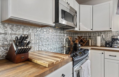 Lansing House | Lansing 3BR near downtown — Game room & EV garage