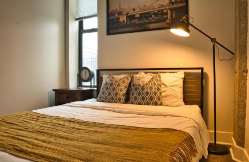 Near South Side Apartment | Luxury 3BR Spacious Suite Sleeps 8 Guests with Patio, Skyline View, Optional Parking and Gym Access Near McCormick Place and Lakefront