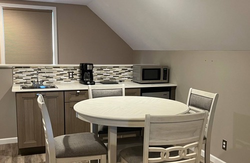 Norton Shores House | Luxury Lakefront 6-Bed Home in Norton Shores with Pool, Hot Tub, Video Games