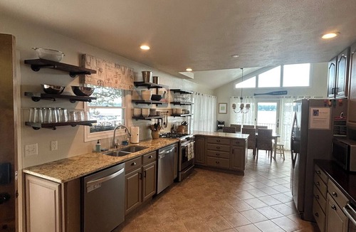 Sister Lakes House | Magician Lakefront - 7 bedrooms, 4.5 baths, screened in porch and coffee bar.