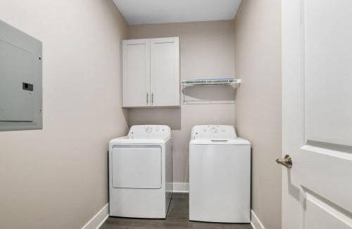 Grandville Apartment | Modern 16BR 16BA Condos w Garage and Patio