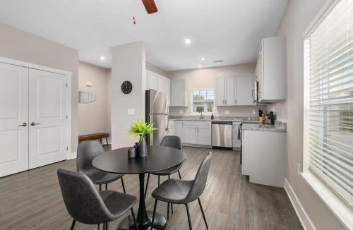 Grandville Apartment | Modern 8BR 8BA Condo w Garage and Patio