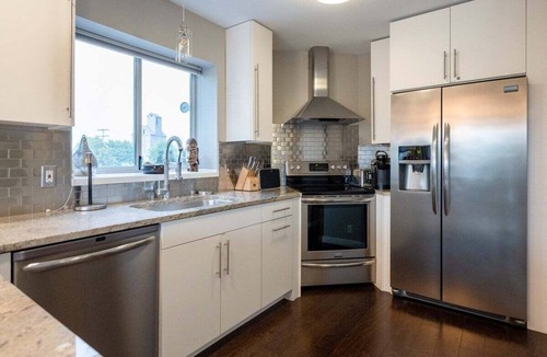 Grand Haven House | Modern Condo with two decks to enjoy the Harbor