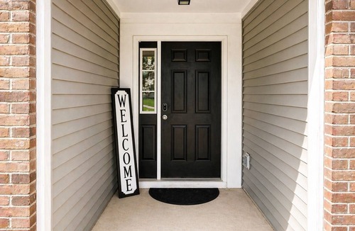 Indianapolis House | Modern, spacious home with high ceilings, yard space, and in a prime location.