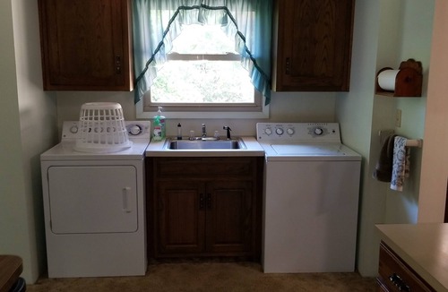 Hillsboro House | Nestled near woods and creek, this large home is near state parks and colleges.