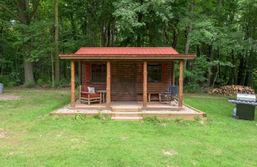 Hartford RV Rental | NEW! Wooded Acres Resort - 2 Small Cabins Plus Separate Building with 2 Bathrooms! Includes A/C and Heat! Dog-friendly with Tents Allowed!