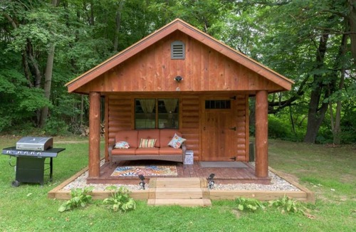 Hartford RV Rental | NEW! Wooded Acres Resort - 2 Small Cabins Plus Separate Building with 2 Bathrooms! Includes A/C and Heat! Dog-friendly with Tents Allowed!