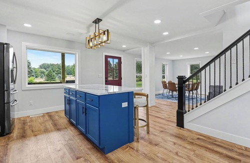 Coloma House | Newly remodeled 5BR farmhouse in Coloma, just 8 minutes to Lake Michigan beach. Enjoy 3,000 sq ft, 2 full baths, smart TVs in every bedroom, a covered deck, large yard, and private balcony off the primary suite.