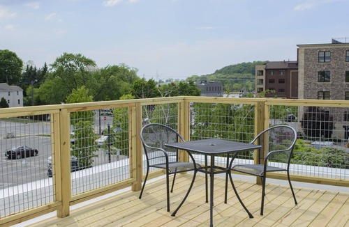 Grand Haven Condo | Newly Renovated Downtown Condo In Historic Fortino's Building
