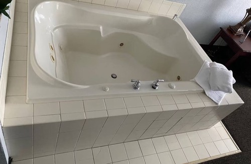 Houghton Lake Hotel | One Room w/King Bed | Free Breakfast | Access to Pool w/Slide & Jacuzzi