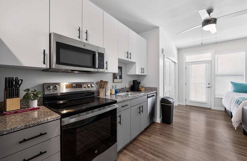 CUF Apartment | Prime Spot Near UC with Work Desk, Balcony & Clubhouse