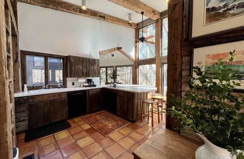 Holland House | Relax in comfortable all seasons retreat nestled in forested dunes along Lk MI