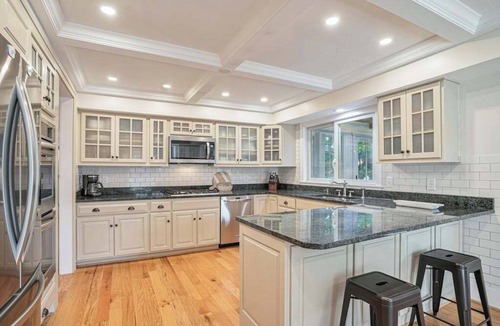 Stevensville House | Relaxing home with private pool, hot tub, game room, & fireplace