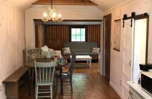 Ludington Cottage | Remodeled lakefront cottage w/marina, firepit, swimming area.