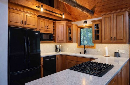 Coloma Cabin | Riverfront Log Cabin Near St Joe & South Haven