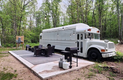 Bitely House | Rustic Converted School Bus with Outdoor Shower Near ORV Trails in Manistee National Forest, Michigan