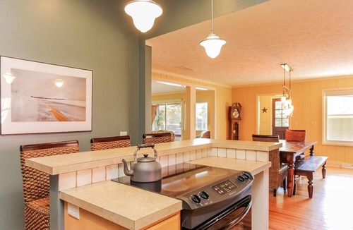 Saugatuck Villa | Screened porch pt water views hot tub walk to Saug