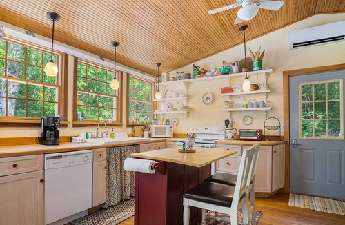 Fennville Cottage | Secluded lakefront cottage with sweeping views, huge deck, washer/dryer, & WiFi