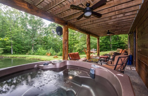 Gnaw Bone Cabin | Secluded Log Cabin w/Pond, Hot Tub & Game Room 3BR, 3.5BA