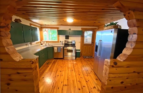 Fulton Cabin | Secluded SW Michigan Lake View Log Cabin w/Fire Pit & Deck on Long Lake