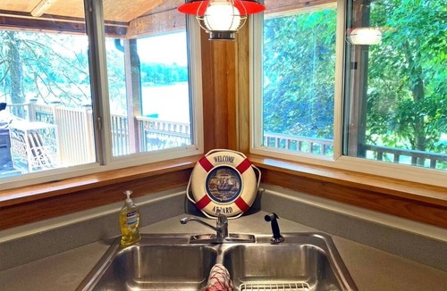 Fulton Cabin | Secluded SW Michigan Lake View Log Cabin w/Fire Pit & Deck on Long Lake