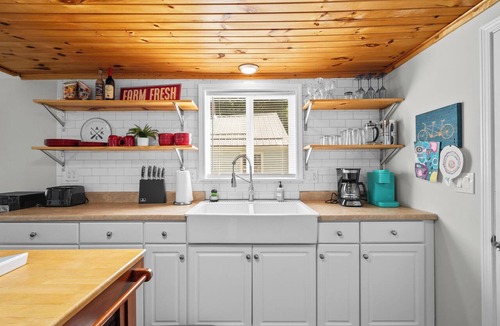 Paw Paw Lake House | Short Description: Lakewood Bungalow | Screened Porch 2 Baths Basement Hangout Walk to Lake Onsite Laundry