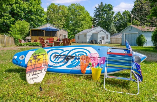 Paw Paw Lake House | Short Description: Lakewood Bungalow | Screened Porch 2 Baths Basement Hangout Walk to Lake Onsite Laundry